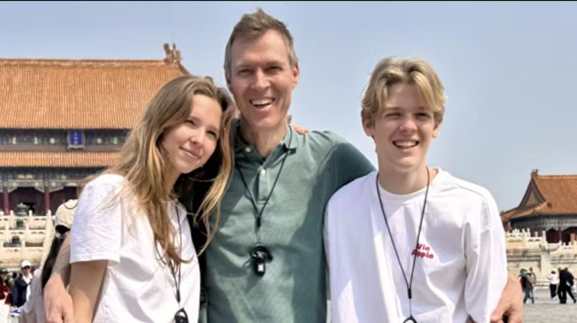 Family guests smiling in Beijing