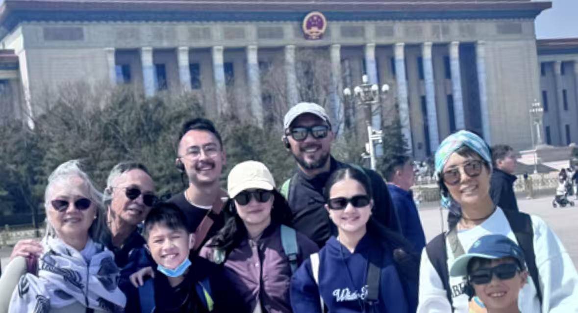 Private group in front of a landmark building at Tiananmen Square